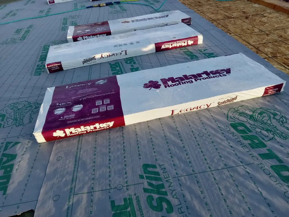 Slide of Universal Quality Roofing