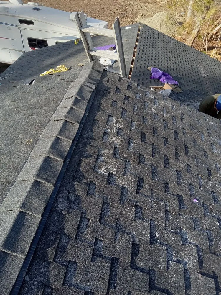 Slide of Universal Quality Roofing