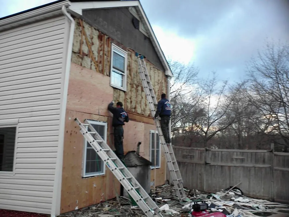 Emergency storm damage roof repair in Selden Ny, NY by Universal Roofing & Chimney