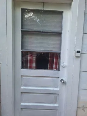 Universal Roofing & Home Improvement Services Logo