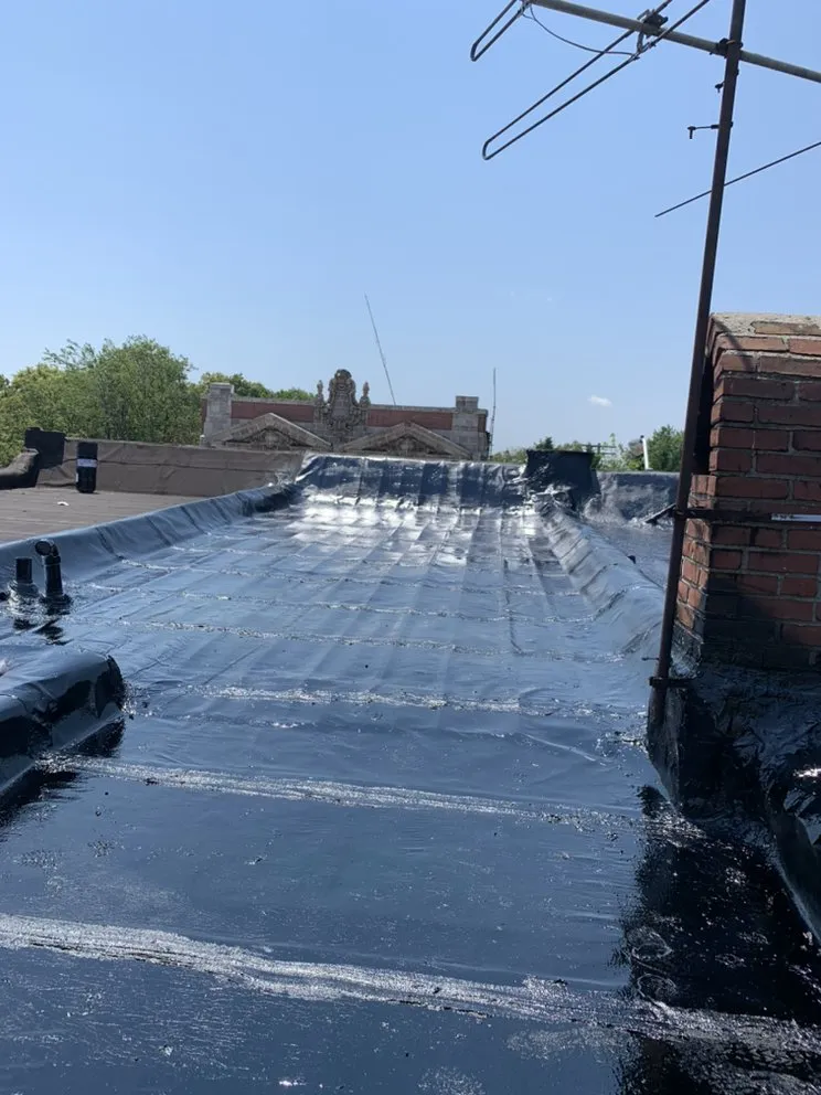 Slide of Universal Roofing & Paving