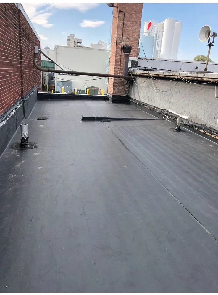 Slide of Universal roofing & Paving