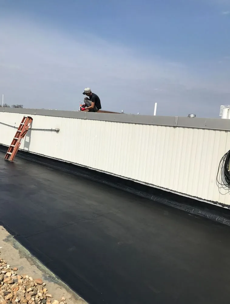 Slide of Universal roofing & Paving