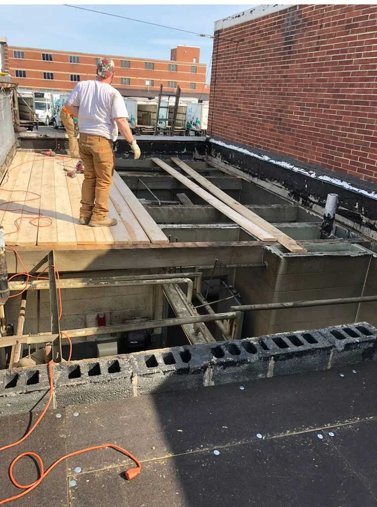 Slide of Universal roofing & Paving