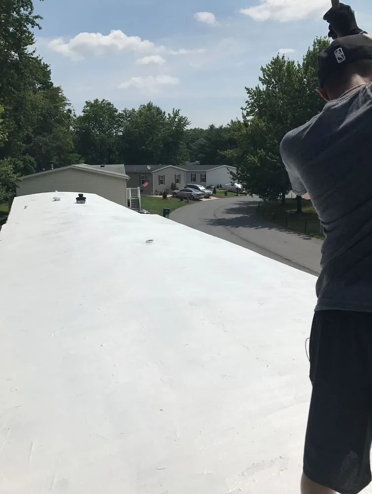 Slide of Universal roofing & Paving