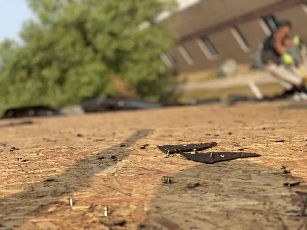 Slide of Universal Roofing