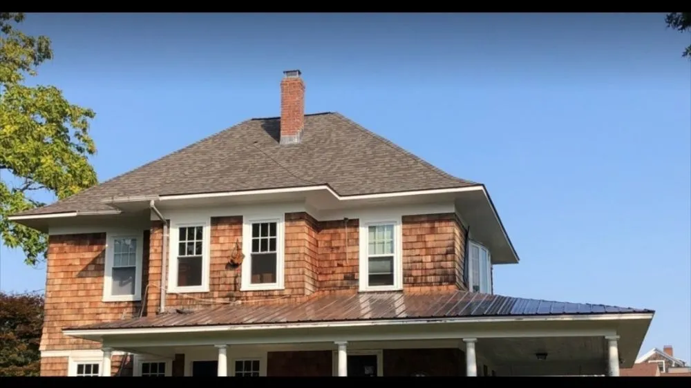 Slide of Universal Roofing Consultants