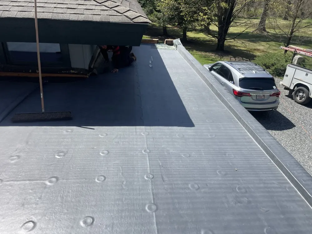 Slide of Universal Roofing