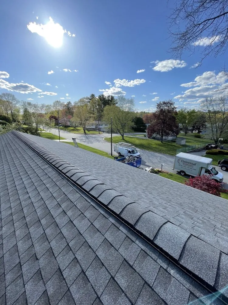 Slide of Universal Roofing Solutions