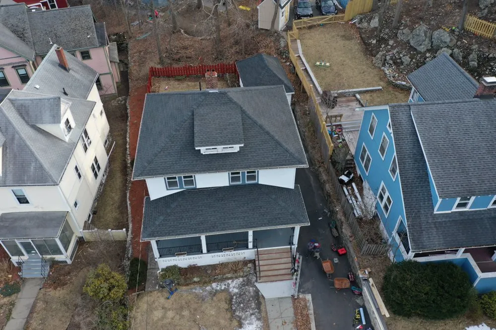 Slide of Universal Roofing Solutions