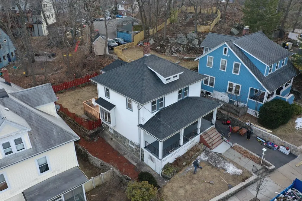 Slide of Universal Roofing Solutions