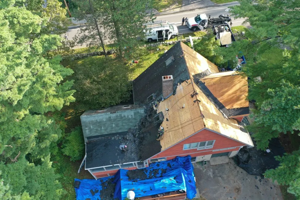 Slide of Universal Roofing Solutions