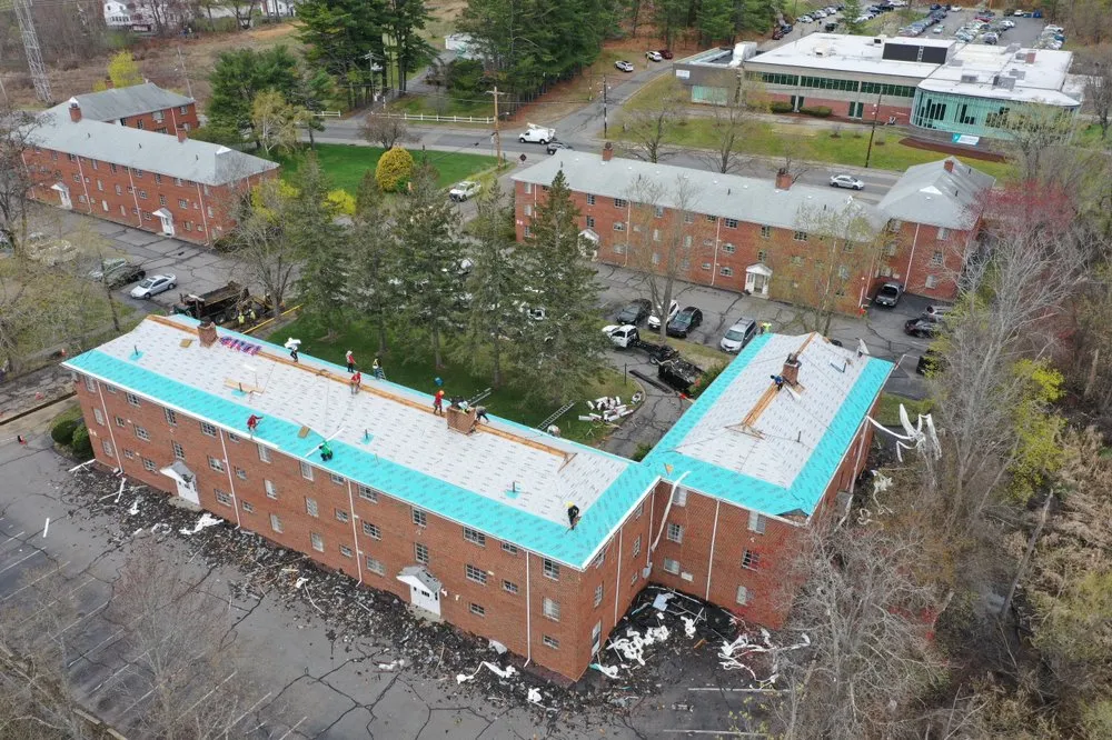 Slide of Universal Roofing Solutions