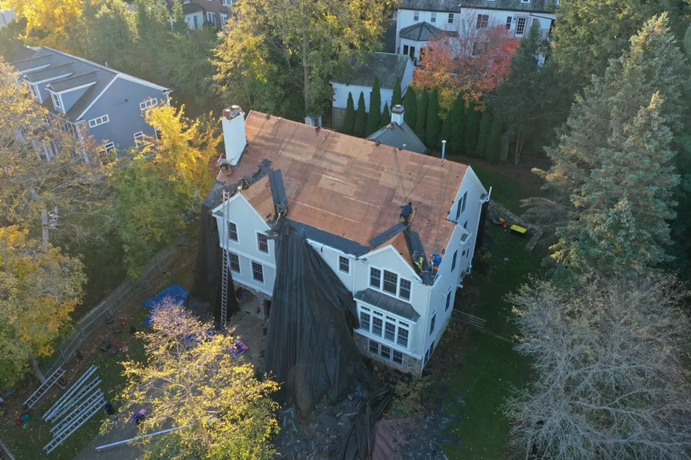 Slide of Universal Roofing Solutions