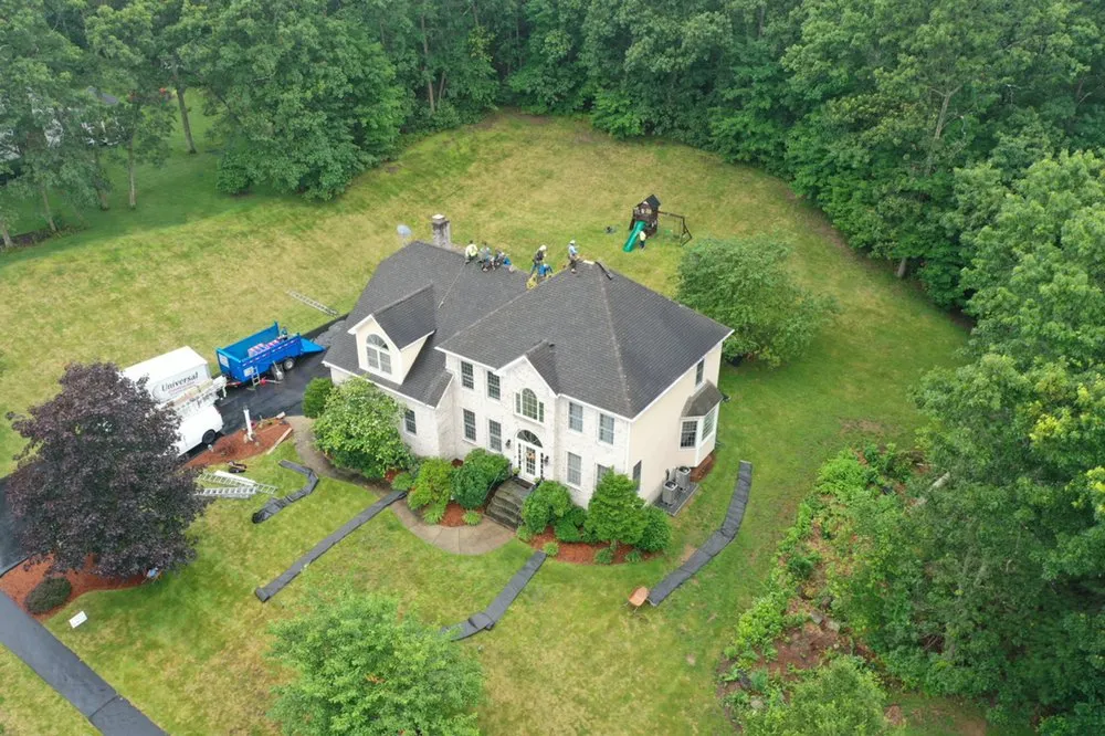 Slide of Universal Roofing Solutions