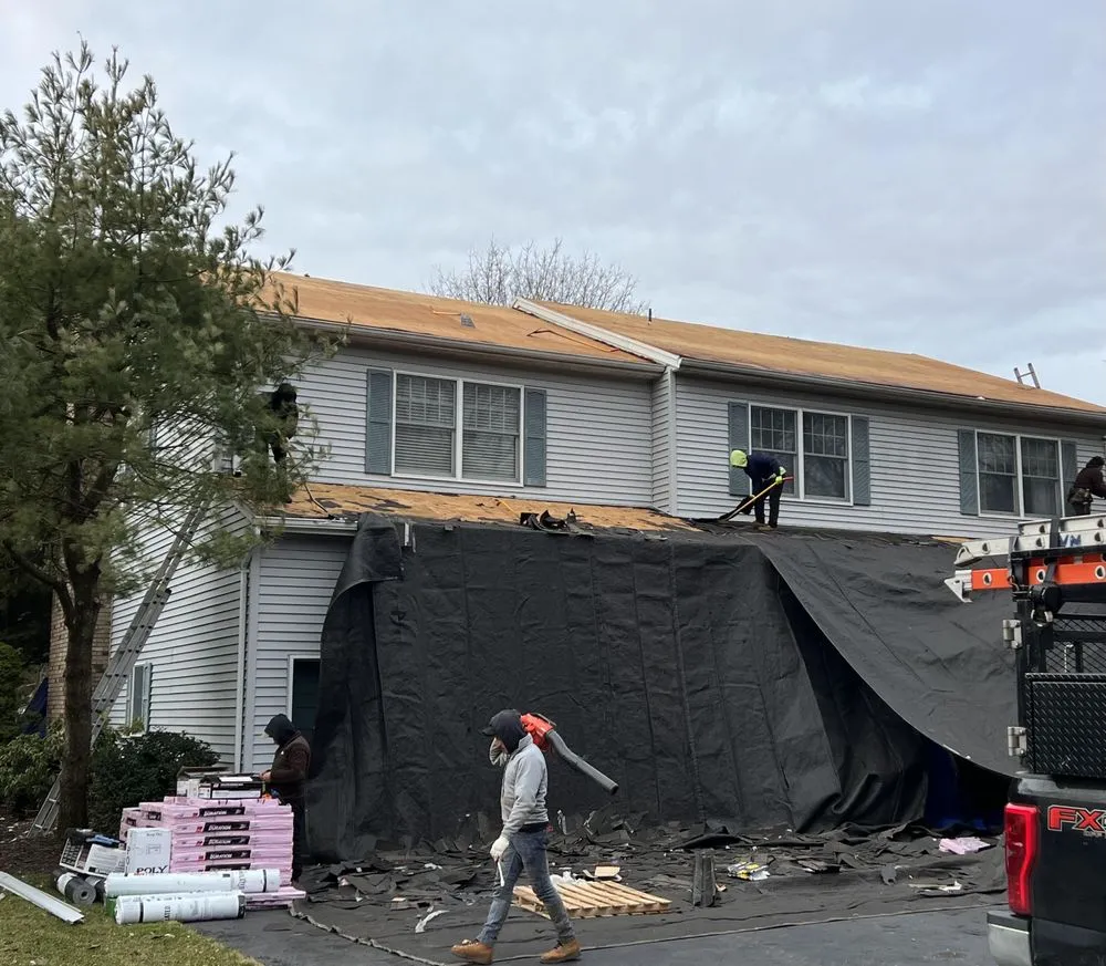 Slide of Universal Roofing Solutions