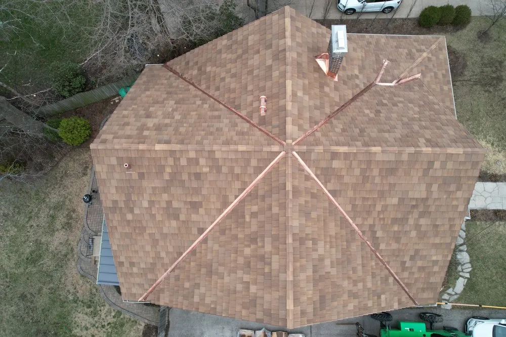 Slide of University Roofing & Construction,