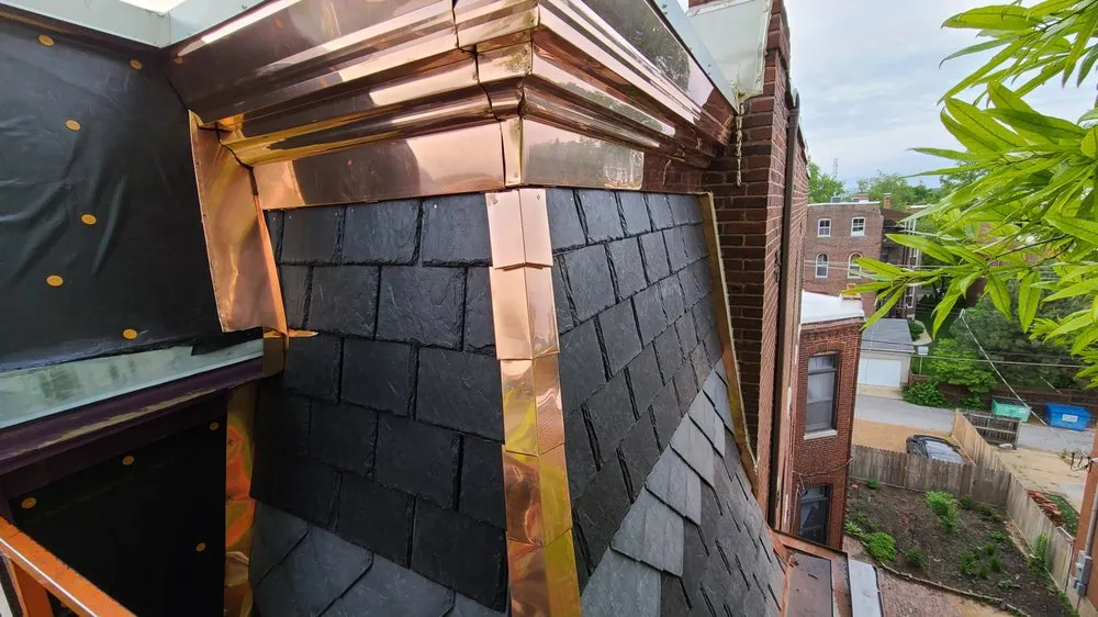 Slide of University Roofing & Construction,