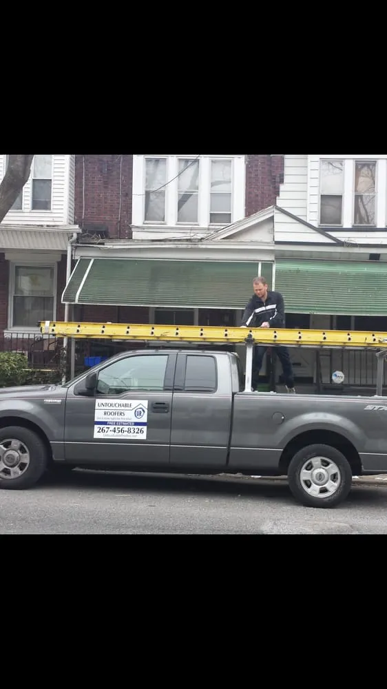 Slide of Untouchable Roofers