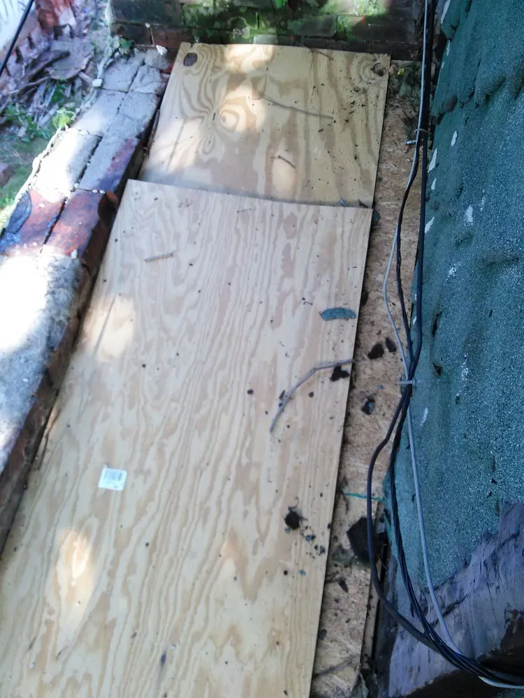 Slide of Untouchable Roofers