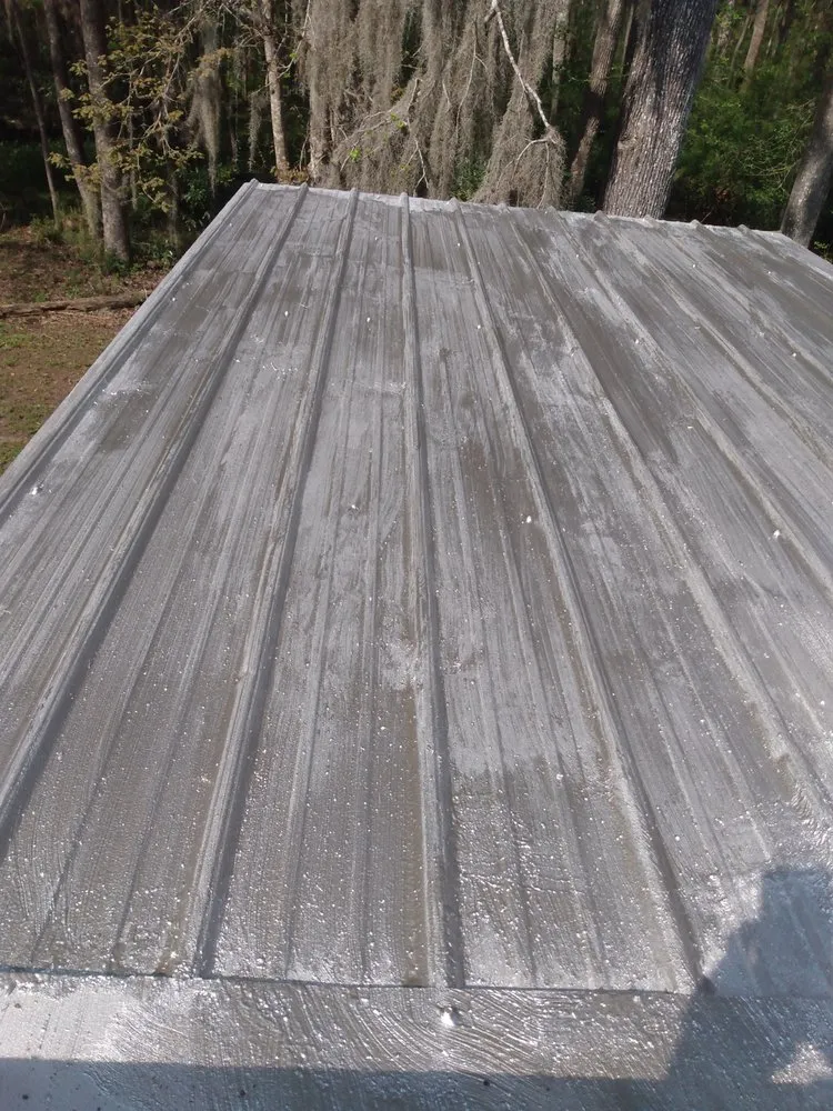 Slide of UnZucky Roofing