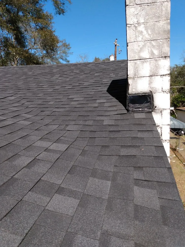 Slide of UnZucky Roofing