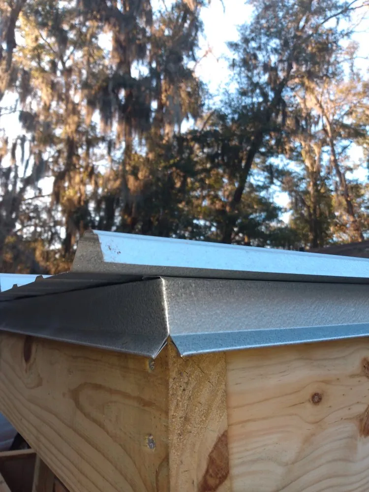 Slide of UnZucky Roofing