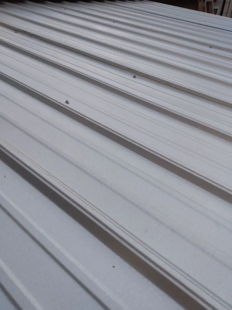 Slide of UnZucky Roofing