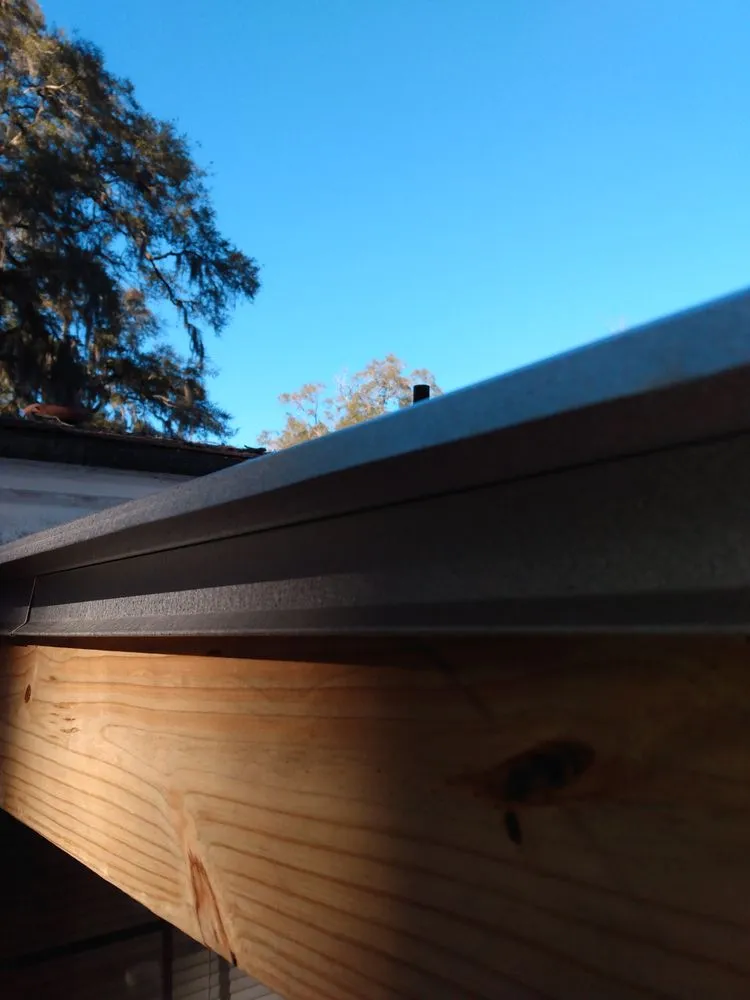 Slide of UnZucky Roofing