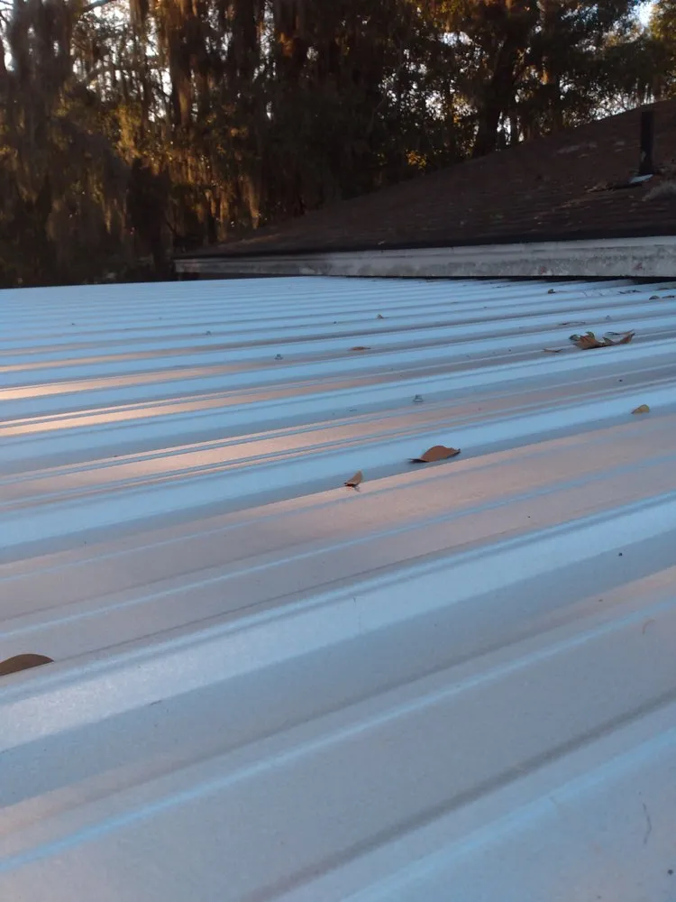 Slide of UnZucky Roofing