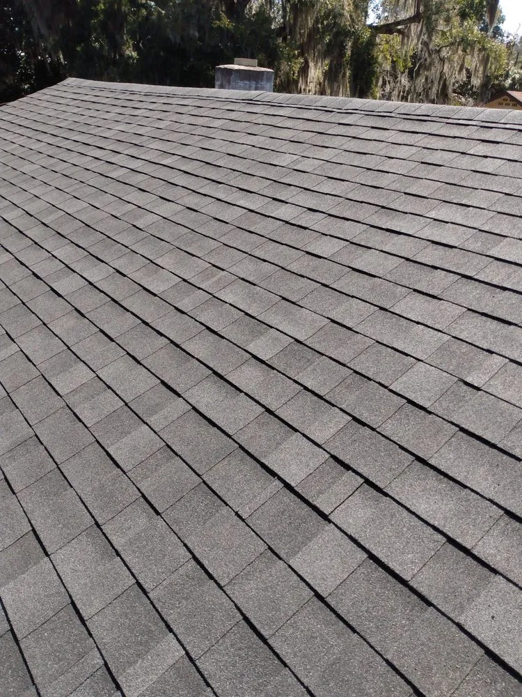 Slide of UnZucky Roofing