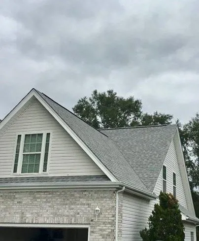 Slide of Up & Over Roofing