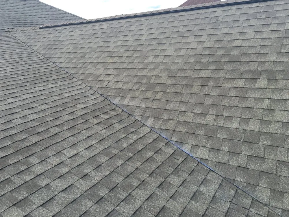 Slide of Up & Over Roofing
