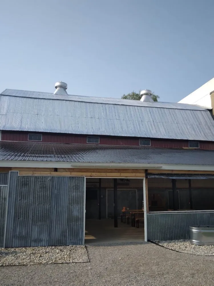 Professional flat roof repair for homes in Lake Ann, MI by Up North Creative Builders
