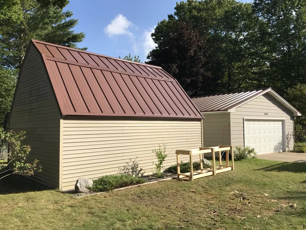 Emergency storm damage roof repair experts serving Williamsburg, MI - Up North Exteriors