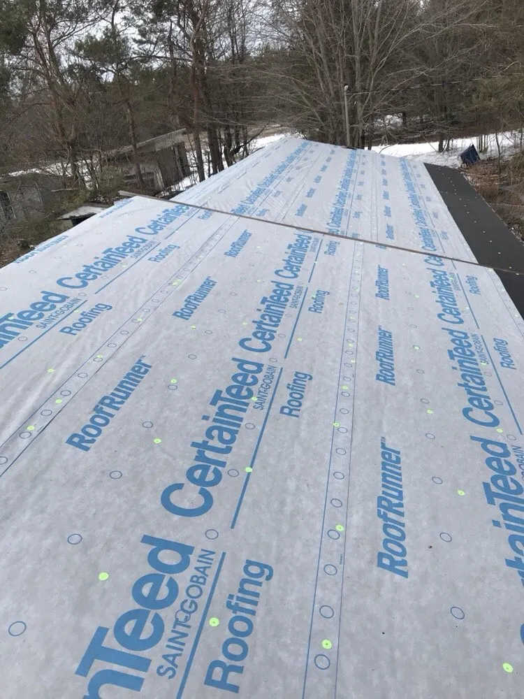 Reliable residential roofing service for homes across Williamsburg, MI - Up North Exteriors