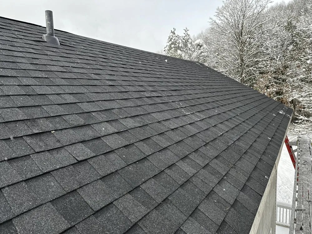 Slide of Up North Roofing