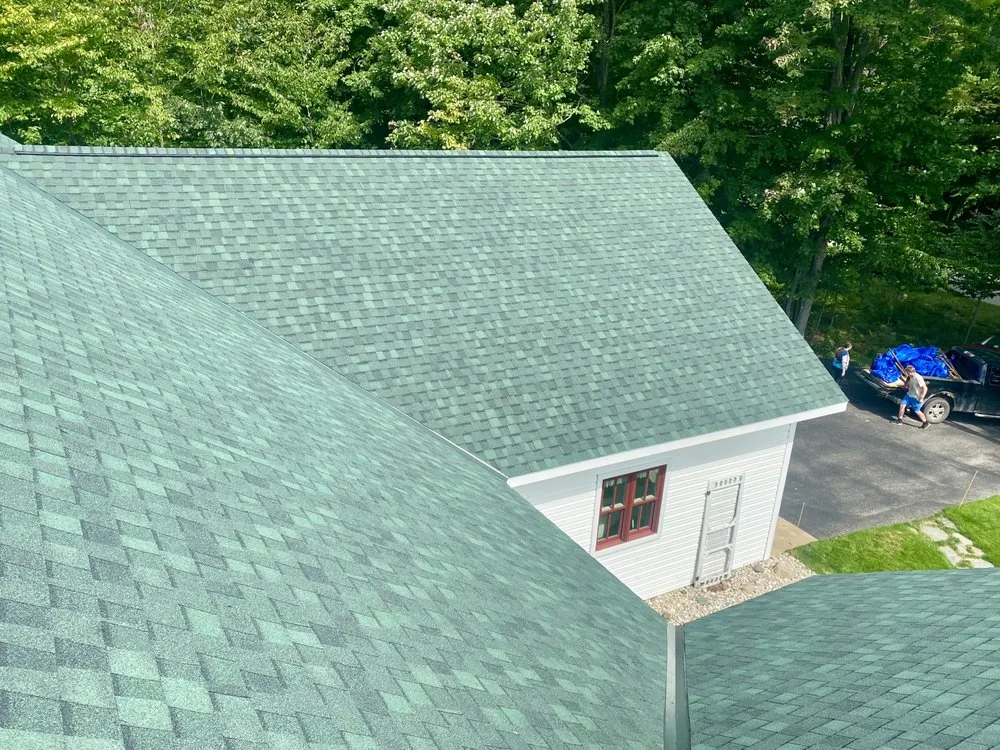 Slide of Up North Roofing