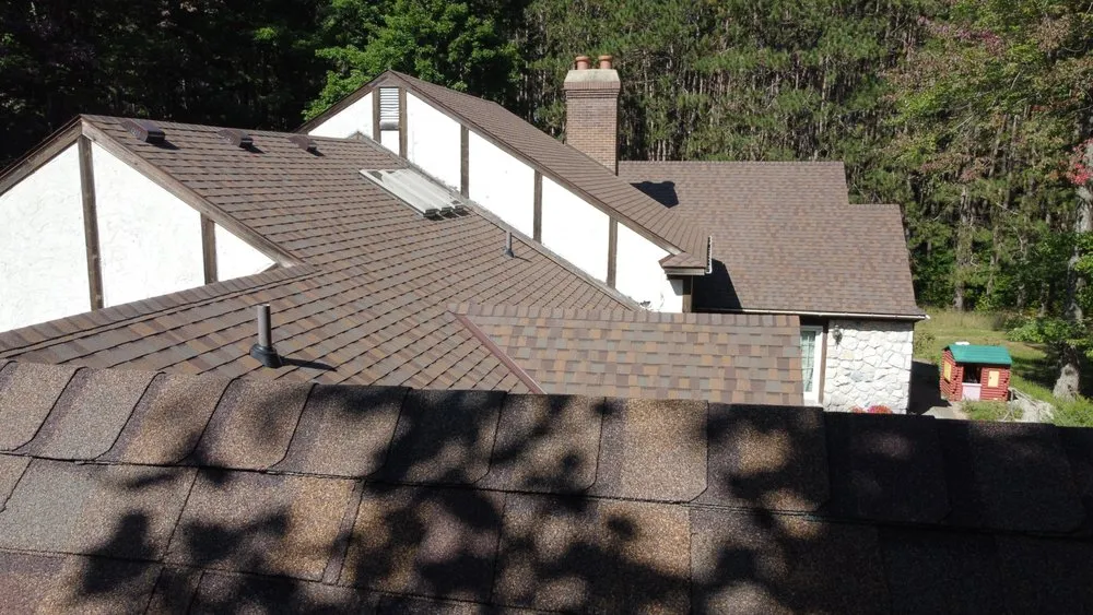 Slide of Up North Roofing