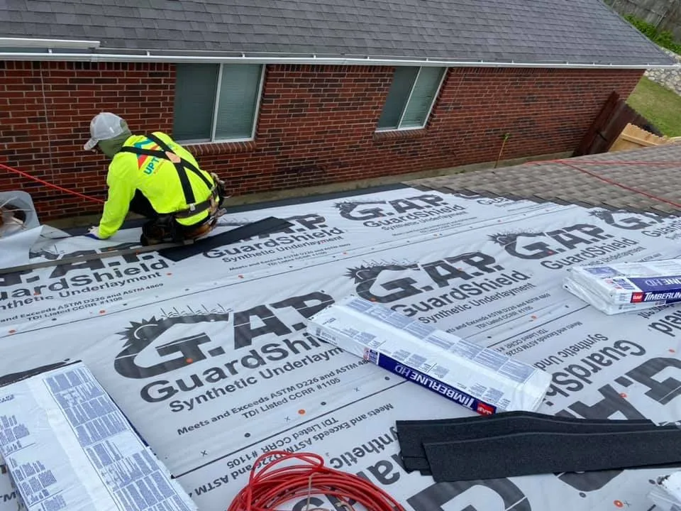 Slide of Up To Date Roofing and Construction