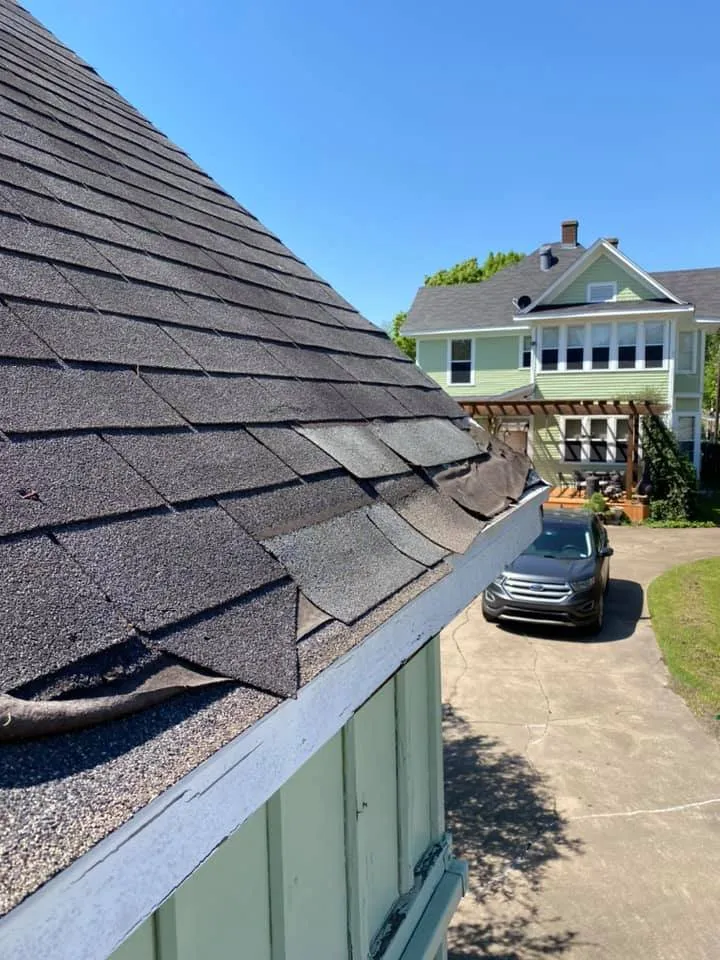 Slide of Up To Date Roofing and Construction