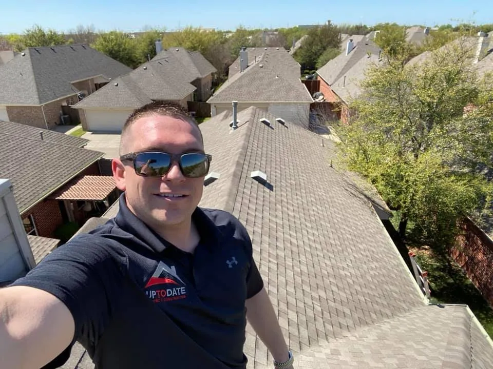 Slide of Up To Date Roofing and Construction