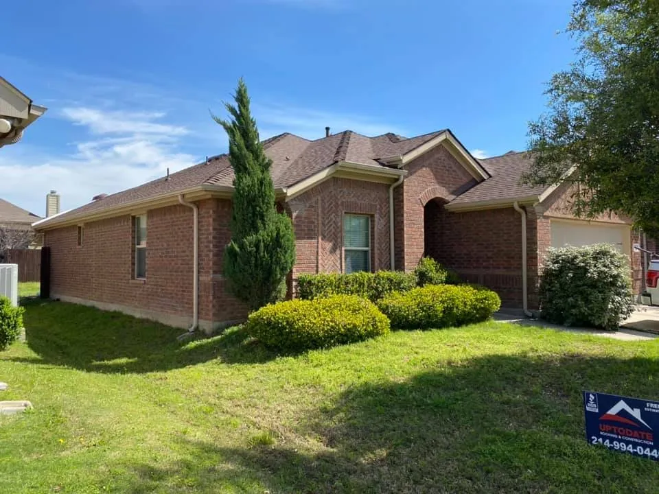 Slide of Up To Date Roofing and Construction