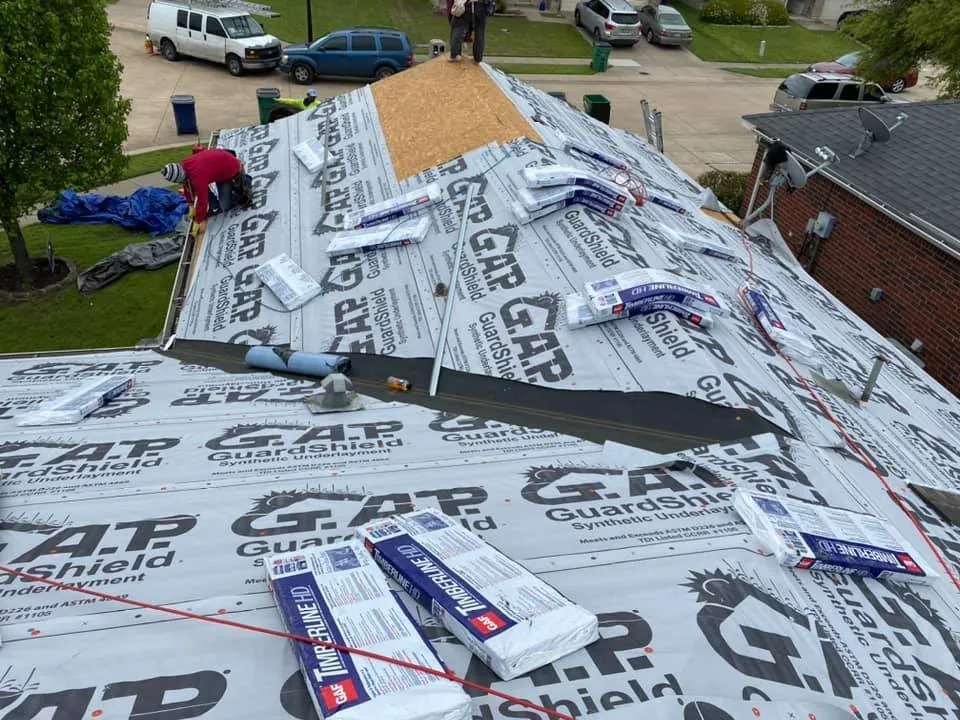 Slide of Up To Date Roofing and Construction