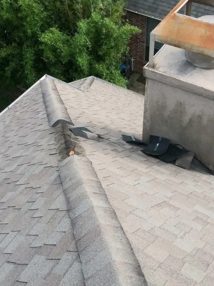 Slide of Upper Hand Roofing & Construction