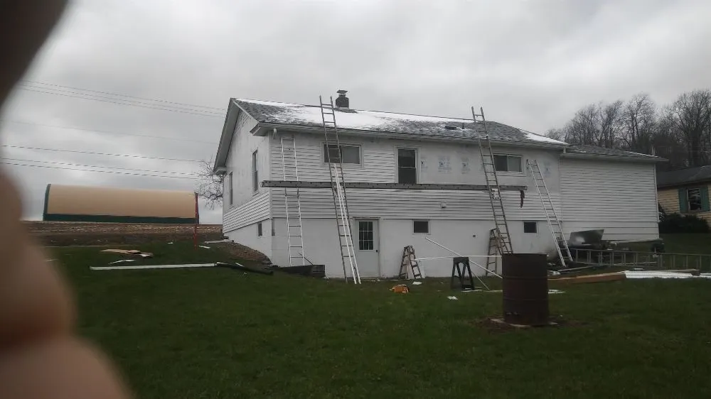 Slide of Uptop Roofing