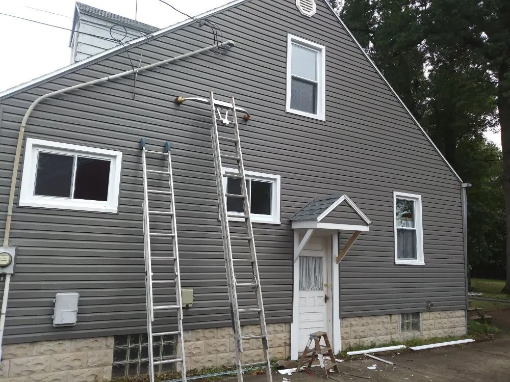 Slide of Uptop Roofing