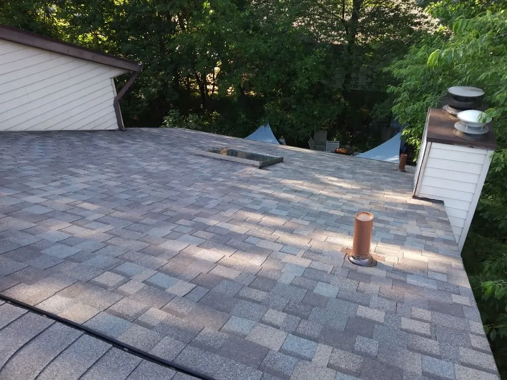 Slide of Uptop Roofing