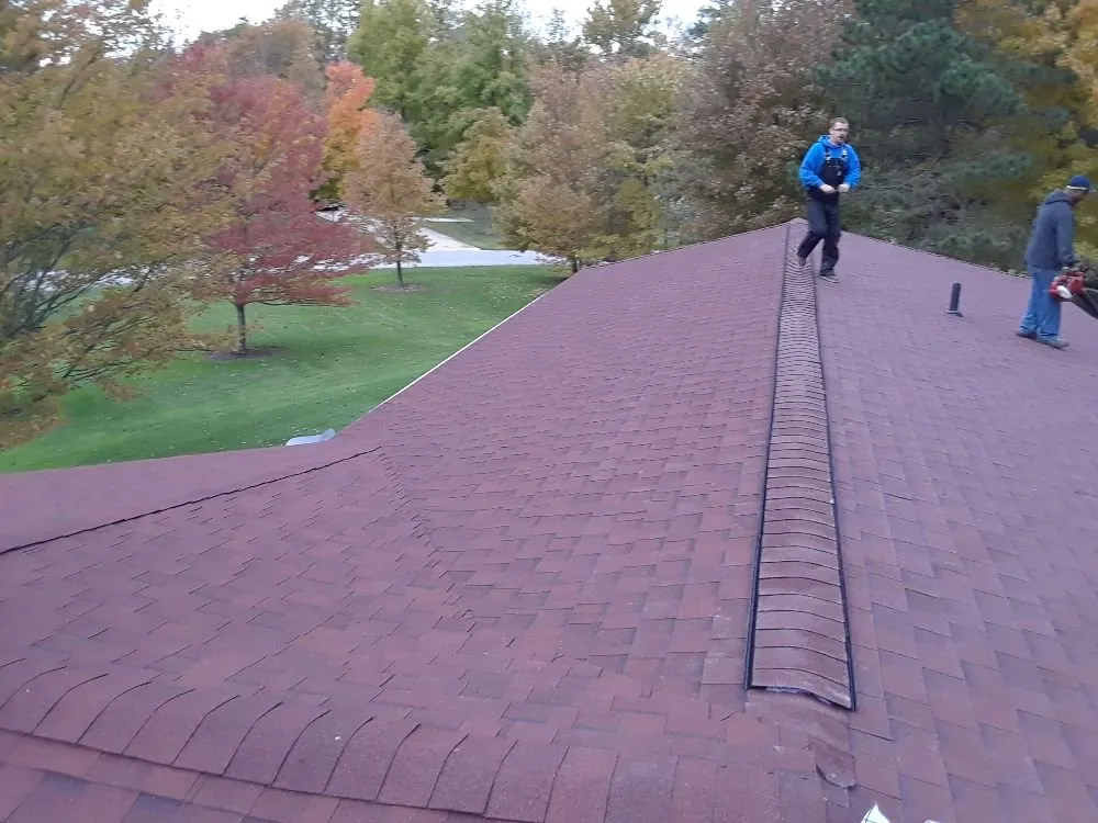 Slide of Uptop Roofing