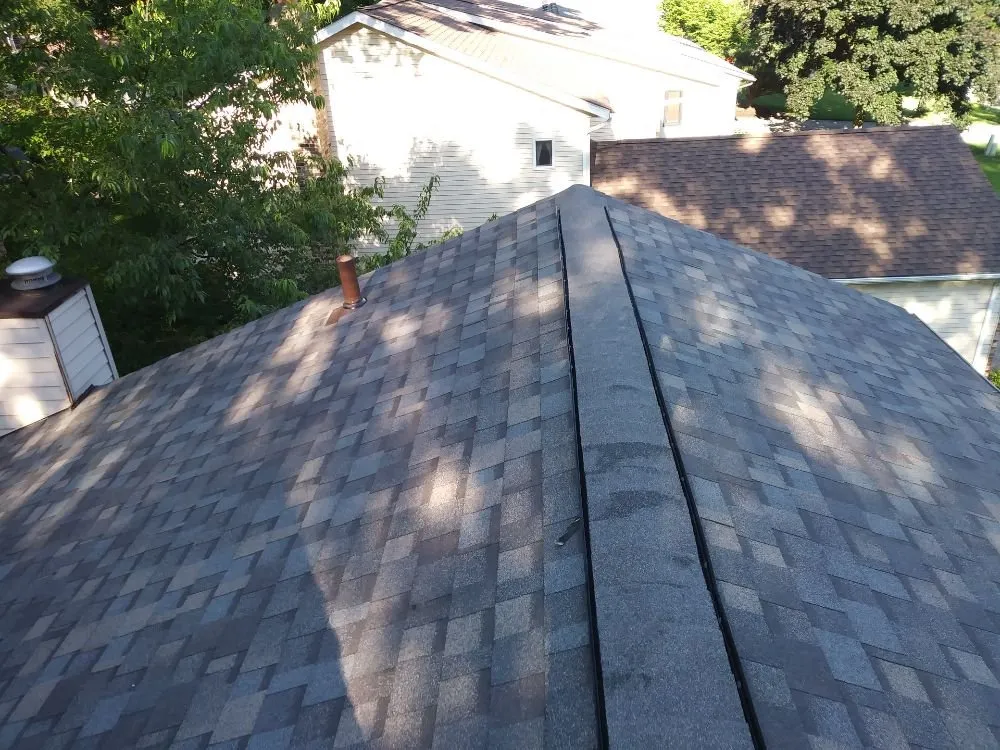 Slide of Uptop Roofing